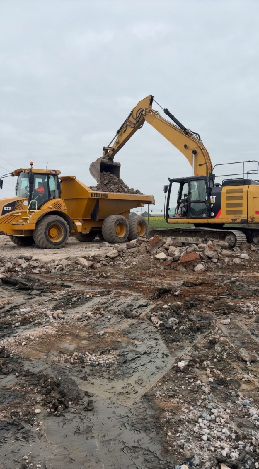 Excavator loading a dumper on a muck-away job