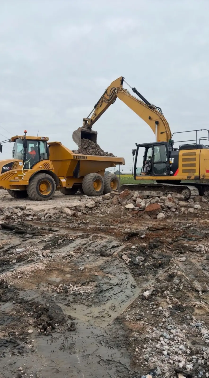 Excavator loading a dumper on a muck-away job